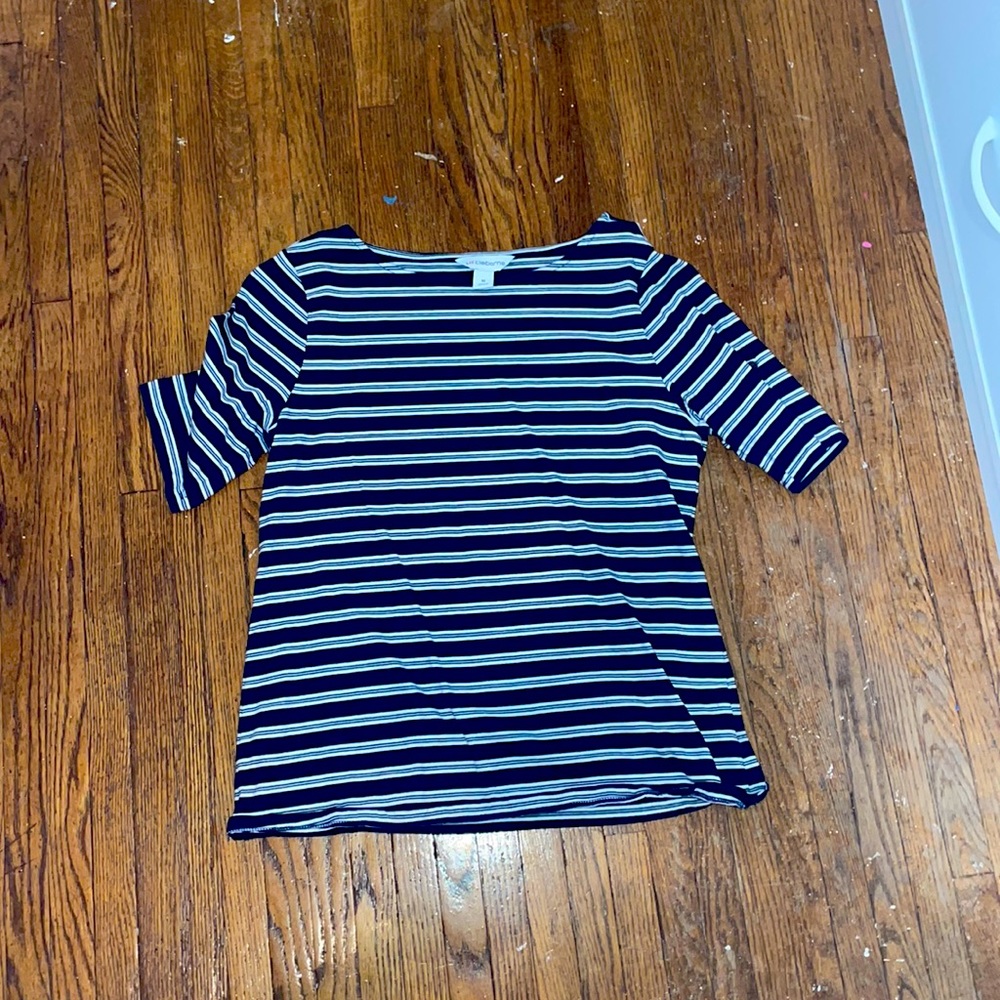 A stripe whit and dark blue shirt